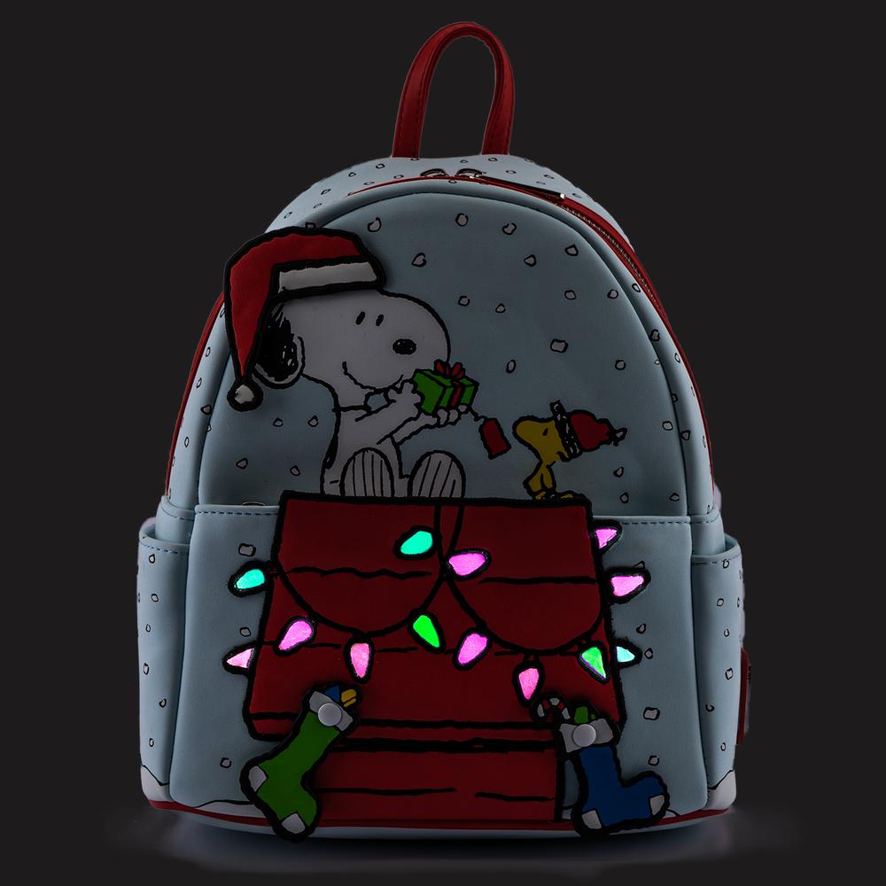 https://circleofhopeboutique.com/cdn/shop/products/Loungefly-Peanuts-Snoopy-and-Woodstock-Glow-in-the-Dark-Mini-Backpack-glow_2048x.jpg?v=1636327207
